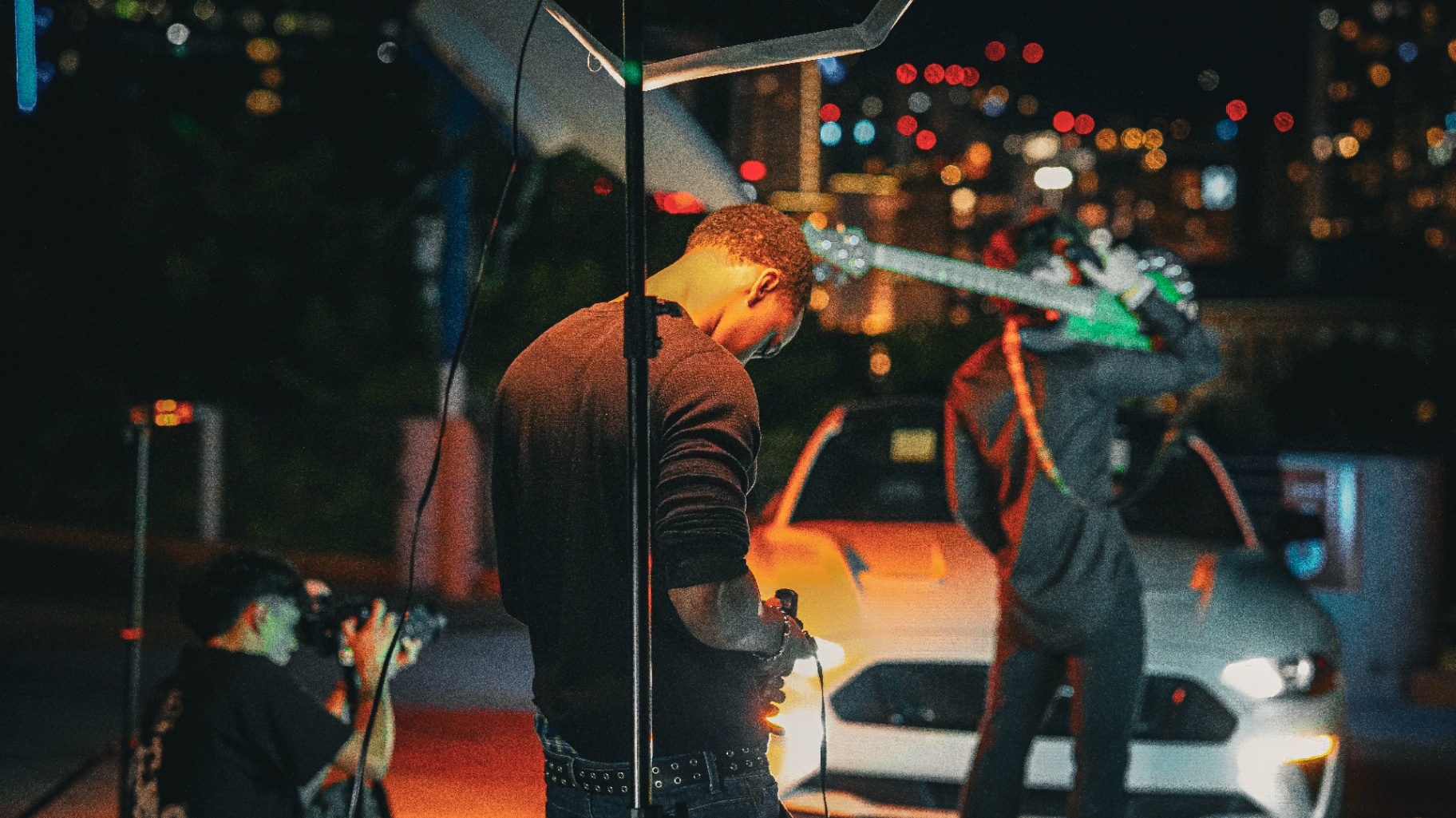 Behind the scenes — guitarist on set